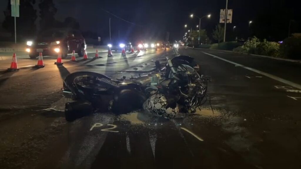 A moped accident scene in Lamia, with emergency responders attending to a critically injured teenager.